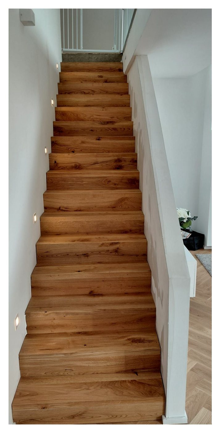 Nachher: Betontreppe mit Eiche verkleidet – vorher und nachher